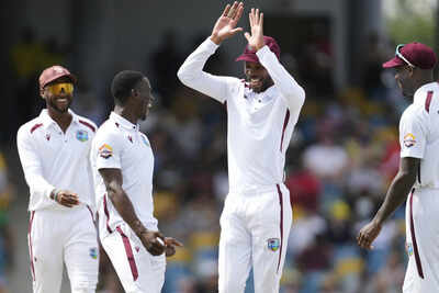 West Indies celebrate a wicket against Australia
