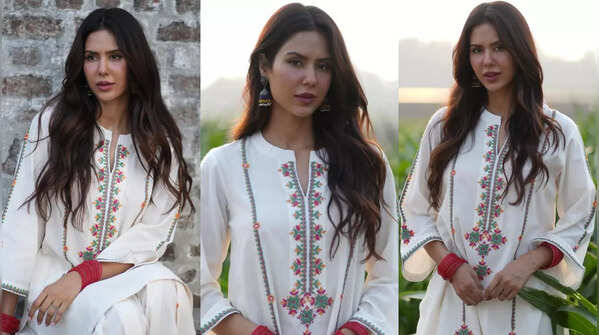Sonam Bajwa accessorizes her outfit with juttis and jhumkas.