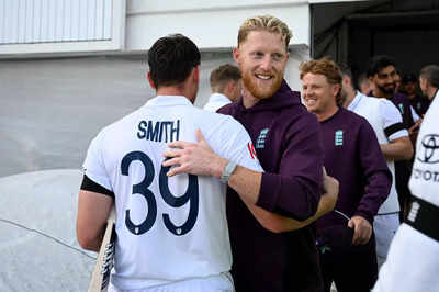 Ben Stokes congratulates Jamie Smith on England's Test victory.