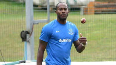 Jofra Archer in action, poised to deliver a ball