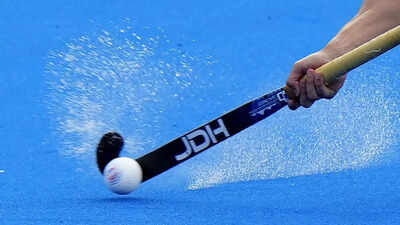 Hockey players in action during a match