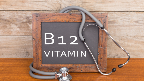 Assortment of foods rich in vitamin B12, including meat, eggs, and dairy products