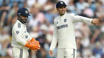 Shubman Gill and Rishabh Pant during a match.