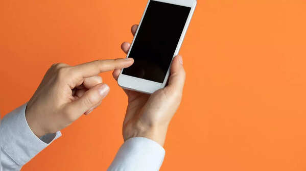 Image of holding phone with one hand, scrolling with index finger.